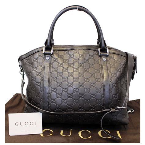 gucci brown leather wide strap shoulder bag|black gucci purse with heart.